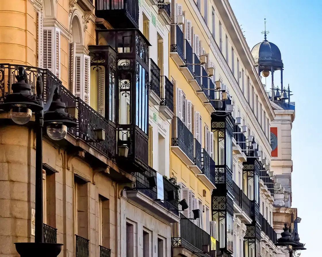 Warm stone facade of a traditional Madrid building