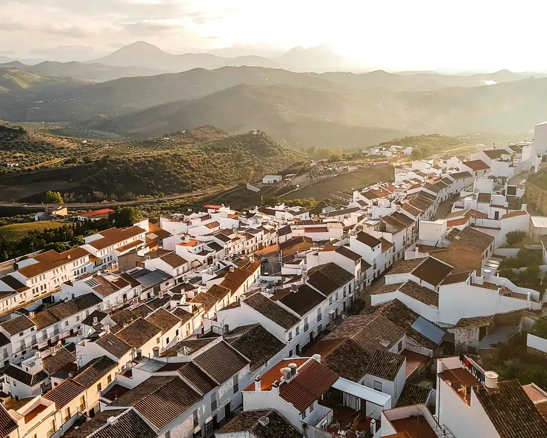 Olvera white village across the Andalusian hills